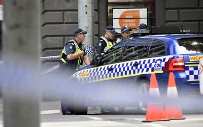 Illustrative photo of police in the central business district of Melbourne, Australia, January 20, 2017. (AP Photo/Andrew Brownbill)