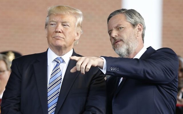 US President Donald Trump stands with Liberty University president, Jerry Falwell Jr., right, during commencement ceremonies at the school in Lynchburg, Va., Saturday, May 13, 2017. (AP Photo/Steve Helber) US President Donald Trump stands with Liberty University president, Jerry Falwell Jr., right, during commencement ceremonies at the school in Lynchburg, Va., Saturday, May 13, 2017. (AP Photo/Steve Helber)