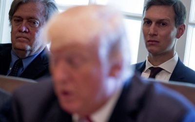 White House senior advisers Steve Bannon, left, and Jared Kushner, listen as US President Donald Trump speaks during a cabinet meeting, June 12, 2017, in the Cabinet Room of the White House in Washington. (AP Photo/Andrew Harnik)
