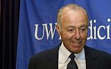 In this April 24, 2003, photo, Jeff Brotman, Chairman of Costco Wholesale Corporation, speaks during a news conference at the University of Washington in Seattle. (AP Photo/Ralph Radford)