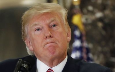 President Donald Trump listens to a question while meeting the media in the lobby of Trump Tower in New York, Tuesday, Aug. 15, 2017. (AP Photo/Pablo Martinez Monsivais)