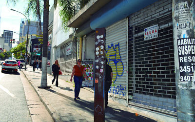 Shuttered storefronts on Sao Paulo's popular Augusta Street. (Luiz Roiz/Times of Israel)