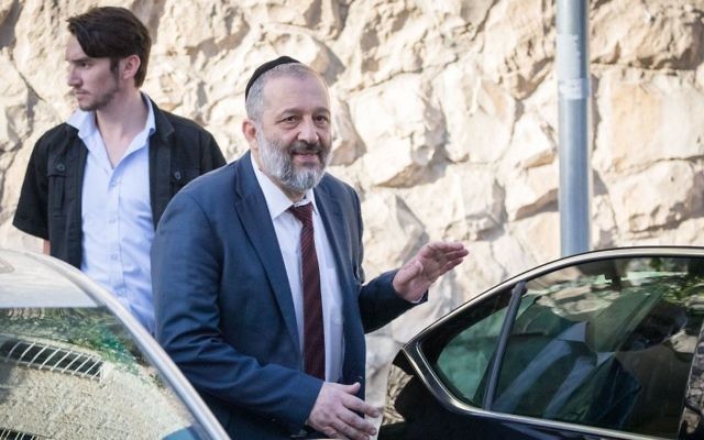 Aryeh Deri seen leaving his home in Jerusalem on the way to questioning at the Lahav 433 anti-corruption unit, June 5, 2017. (Yonatan Sindel/Flash90) Aryeh Deri seen leaving his home in Jerusalem on the way to questioning at the Lahav 433 anti-corruption unit, June 5, 2017. (Yonatan Sindel/Flash90)