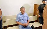 Miki Ganor, arrested in the submarine affair known as case 3000, is brought for a court hearing at the Magistrate's Court in Rishon Lezion, July 21, 2017. (FLASH90)