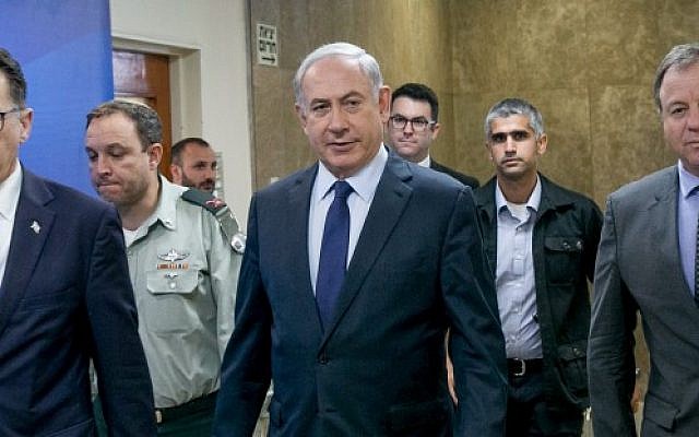 Prime Minister Benjamin Netanyahu arrives to the weekly cabinet meeting at Prime Minister's Office in Jerusalem on July 30, 2017. (Ohad Zweigenberg/POOL) Prime Minister Benjamin Netanyahu arrives to the weekly cabinet meeting at Prime Minister's Office in Jerusalem on July 30, 2017. (Ohad Zweigenberg/POOL)