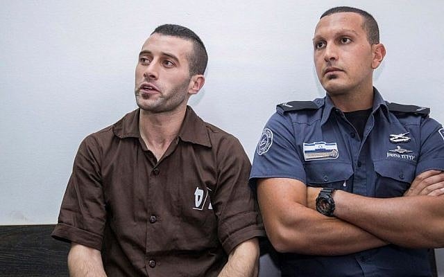 Nablus resident Muhammad Harouf (left) attends a hearing at the Jerusalem Magistrate's Court on August 2, 2017. (Yonatan Sindel/Flash90) Nablus resident Muhammad Harouf (left) attends a hearing at the Jerusalem Magistrate's Court on August 2, 2017. (Yonatan Sindel/Flash90)