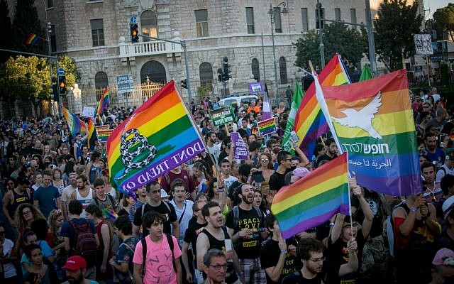 People participate in the annual Gay Pride parade in central Jerusalem, under heavy security on August 3, 2017. (Miriam Alster/Flash90) People participate in the annual Gay Pride parade in central Jerusalem, under heavy security on August 3, 2017. (Miriam Alster/Flash90)