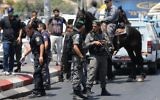 Israeli forces at the scene of a stabbing attack near Damascus Gate in Jerusalem on August 12, 2017. One man was injured and the Palestinian assailant detained. (Yonatan Sindel/Flash90)