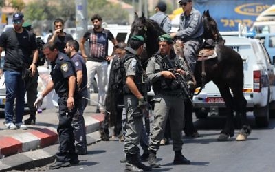 Israeli l forces at the scene of a stabbing attack near Damascus Gate in Jerusalem on August 12, 2017. One man was injured and the Palestinian assailant detained. (Yonatan Sindel/Flash90)