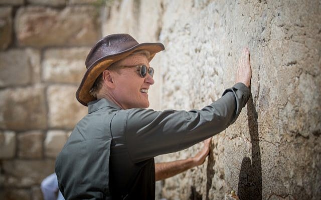 American TV host Conan O'Brien visits the Western Wall in the Old City of Jerusalem on August 28, 2017, to film an episode of his travel series 'Conan Without Borders.' (Yonatan Sindel/Flash90) American TV host Conan O'Brien visits the Western Wall in the Old City of Jerusalem on August 28, 2017, to film an episode of his travel series 'Conan Without Borders.' (Yonatan Sindel/Flash90)