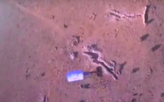 Footage from a video said to show bombs being dropped along the Lebanon-Syrian border by an attack drone belonging to the Hezbollah terror group. (Screen capture: YouTube)