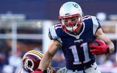 Julian Edelman of the New England Patriots carries the ball against the Washington Redskins at Gillette Stadium on November 8, 2015 in Foxboro, Massachusetts. (Maddie Meyer/Getty Images via JTA)