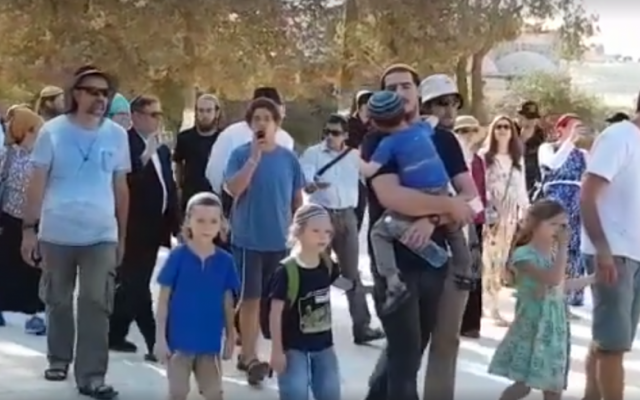 Jews visit the Old City of Jerusalem's Temple Mount compound on the Tisha B'Av fast day commemorating the destruction of the Jewish temples that once stood at the holy site, on August 1, 2017. (screen capture: Facebook) Jews visit the Old City of Jerusalem's Temple Mount compound on the Tisha B'Av fast day commemorating the destruction of the Jewish temples that once stood at the holy site, on August 1, 2017. (screen capture: Facebook)