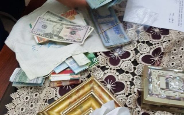 Illustrative: Money seized by Israeli security forces, which is suspected of having been given to families of terrorists by Hamas, on August 14, 2017. (Shin Bet) Illustrative: Money seized by Israeli security forces, which is suspected of having been given to families of terrorists by Hamas, on August 14, 2017. (Shin Bet)