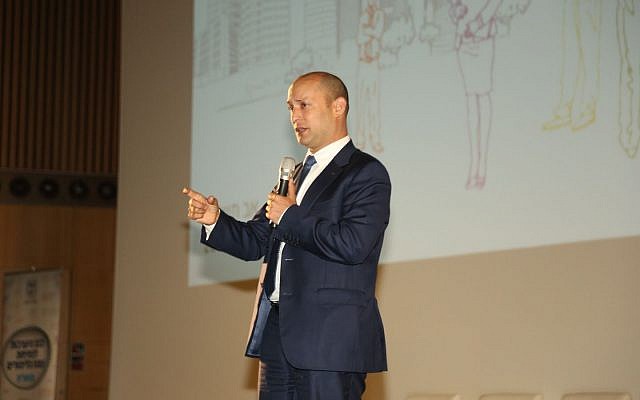 Education Minister Naftali Bennett addresses a conference of principals in the Tel Aviv district on August 24, 2017 (Michael Dimenstein/courtesy)