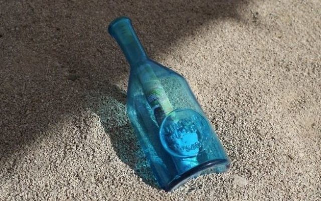Illustrative: Message inside of a bottle sent by Palestinian children in Gaza as part of UNRWA campaign. (Screen capture/YouTube) Illustrative: Message inside of a bottle sent by Palestinian children in Gaza as part of UNRWA campaign. (Screen capture/YouTube)