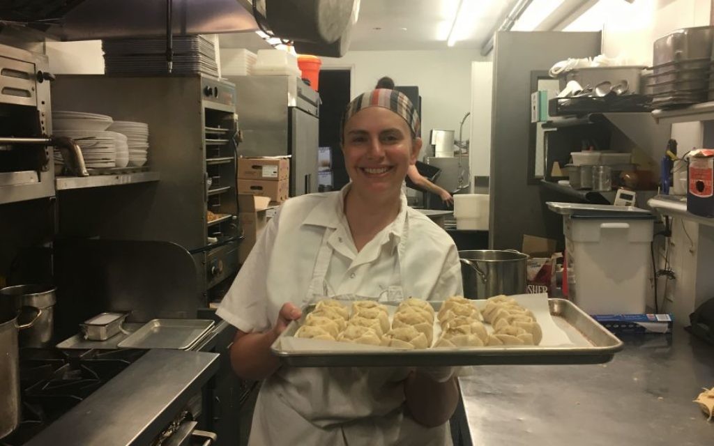 Larissa Raphael showing off her potato-onion knishes in Brooklyn, August 2, 2017. (Josefin Dolsten/JTA) Larissa Raphael showing off her potato-onion knishes in Brooklyn, August 2, 2017. (Josefin Dolsten/JTA)