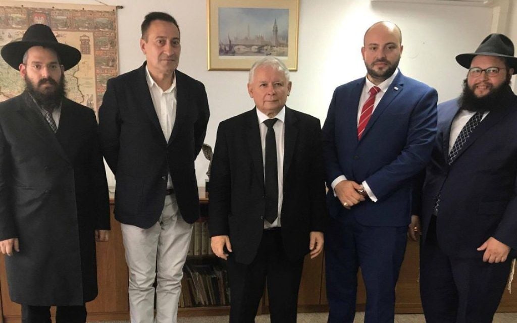 From left: Rabbi Shalom Stembler, head of Chabad Poland; Polish actor and director Artur Hofman; Jaroslaw Kaczynski, head of Poland's Law and Justice party; Jonny Daniels, head of From the Depths; and Rabbi Eliezer Gurary, head of Chabad Krakow, following their meeting in Warsaw, August 16, 2017. (Courtesy of From the Depths/via JTA) From left: Rabbi Shalom Stembler, head of Chabad Poland; Polish actor and director Artur Hofman; Jaroslaw Kaczynski, head of Poland's Law and Justice party; Jonny Daniels, head of From the Depths; and Rabbi Eliezer Gurary, head of Chabad Krakow, following their meeting in Warsaw, August 16, 2017. (Courtesy of From the Depths/via JTA)