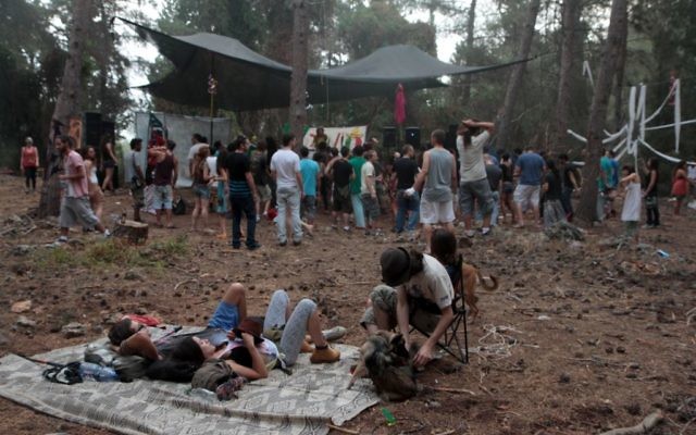 Illustrative photo of Israelis camping at a nature party in the Mount Carmel forest, June 16, 2012. (Alana Perino/Flash90) Illustrative photo of Israelis camping at a nature party in the Mount Carmel forest, June 16, 2012. (Alana Perino/Flash90)