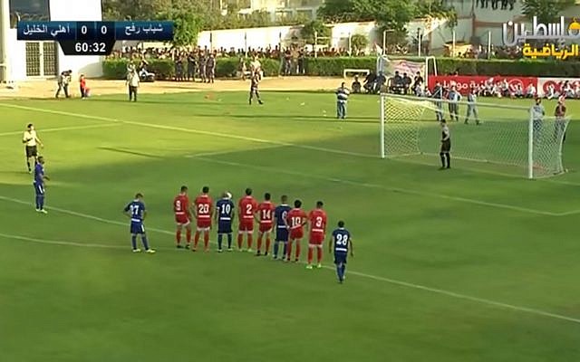 Shabaab Rafah soccer club, from the Gaza Strip, take a penalty against Hebron's Ahli al-Khalil, in the first leg of the Palestine Cup final, August 1, 2017. (Screen capture: YouTube) Shabaab Rafah soccer club, from the Gaza Strip, take a penalty against Hebron's Ahli al-Khalil, in the first leg of the Palestine Cup final, August 1, 2017. (Screen capture: YouTube)