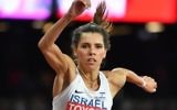 Israel's Hanna Knyazyeva-Minenko competes in the final of the women's triple jump athletics event at the 2017 IAAF World Championships at the London Stadium in London on August 7, 2017. (AFP PHOTO / Andrej ISAKOVIC)