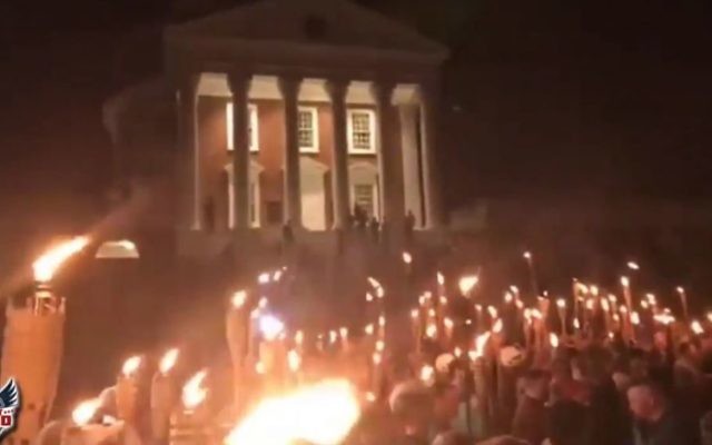 Torch-wielding white supremacists march at the University of Virginia on August 11, 2017 (Screen Capture/ YouTube) Torch-wielding white supremacists march at the University of Virginia on August 11, 2017 (Screen Capture/ YouTube)