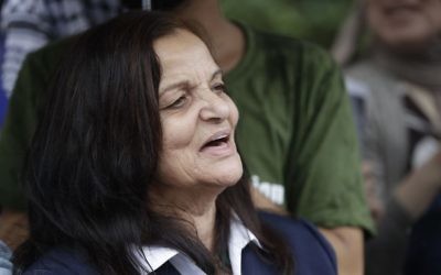 Rasmea Odeh stands outside the Theodore Levin US Courthouse in Detroit, on August 17, 2017, for a final court hearing before she was deported for concealing her convictions in two Jerusalem bombings. (Carlos Osorio/AP)