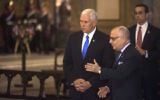 Vice President Mike Pence, left, with Argentine Foreign Minister Jorge Faurie during a wreath-laying ceremony at the Metropolitan cathedral in Buenos Aires, August 15, 2017. (Eitan Abramovich/AFP/Getty Images)