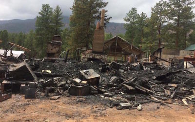 The remains of the Camp Ramah Rockies site after a fire, August 7, 2017. (North Fork Fire Rescue/Facebook via JTA)