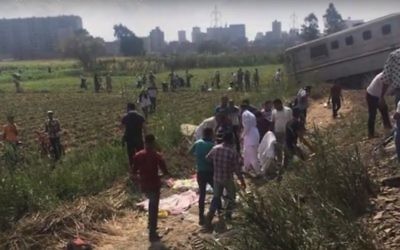 Survivors near the tracks after a train crash in Egypt, on Friday August 11, 2017. (Screen capture YouTube)