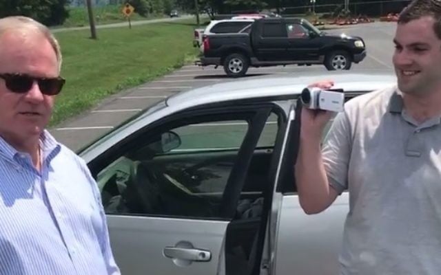 Scott Wagner, left, and a tracker in a video posted July 19, 2017. (screen capture: Facebook) Scott Wagner, left, and a tracker in a video posted July 19, 2017. (screen capture: Facebook)