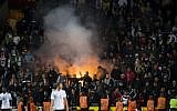 German supporters light flares during the FIFA World Cup 2018 qualification soccer match between Czech Republic and Germany in Prague, Czech Republic, on September 1, 2017. (AFP/Robert Michael)