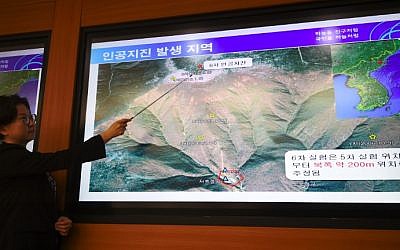 Lee Mi-Seon, a director of the National Earthquake and Volcano Center, shows a map of an area in North Korea during a briefing about the nuclear test in North Korea, at the Korea Meteorological Administration in Seoul on September 3, 2017. (AFP Photo/Jung Yeon-Je)