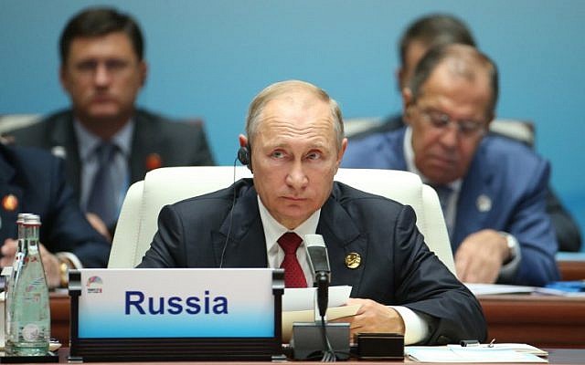 Russian President Vladimir Putin attends the Dialogue of Emerging Market and Developing Countries on the sidelines of the 2017 BRICS Summit in Xiamen, southeastern China's Fujian Province, September 5, 2017. (AFP/POOL/WU HONG) Russian President Vladimir Putin attends the Dialogue of Emerging Market and Developing Countries on the sidelines of the 2017 BRICS Summit in Xiamen, southeastern China's Fujian Province, September 5, 2017. (AFP/POOL/WU HONG)