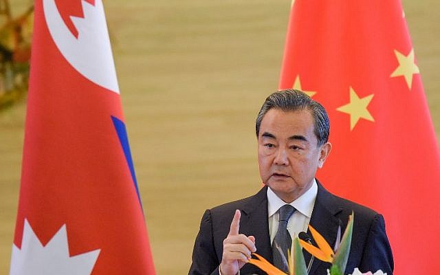 China's Foreign Minister Wang Yi speaks during a press conference in Beijing September 7, 2017. (AFP/POOL/Etienne Oliveau) China's Foreign Minister Wang Yi speaks during a press conference in Beijing September 7, 2017. (AFP/POOL/Etienne Oliveau)