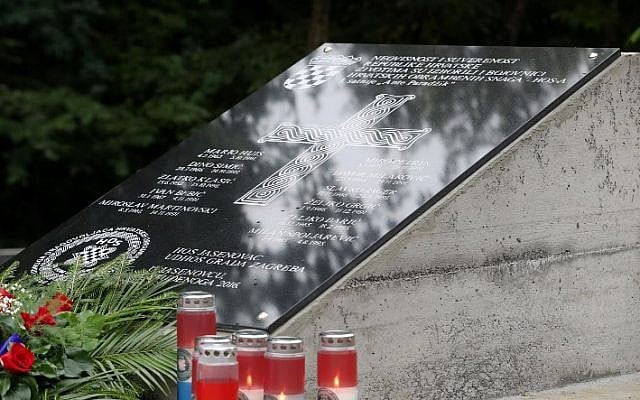 A memorial plaque with an Ustasha pro-Nazi slogan is pictured after it was moved from the vicinity of the WWII extermination camp of Janesovac, to a Croatian memorial site near Novska on September 7, 2017. (AFP PHOTO / STRINGER) A memorial plaque with an Ustasha pro-Nazi slogan is pictured after it was moved from the vicinity of the WWII extermination camp of Janesovac, to a Croatian memorial site near Novska on September 7, 2017. (AFP PHOTO / STRINGER)