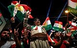 Iraqi Kurds celebrate while urging people to vote in the upcoming independence referendum in Arbil, the capital of the autonomous Kurdish region of northern Iraq, on September 8, 2017. (AFP Photo/Safin Hamed)