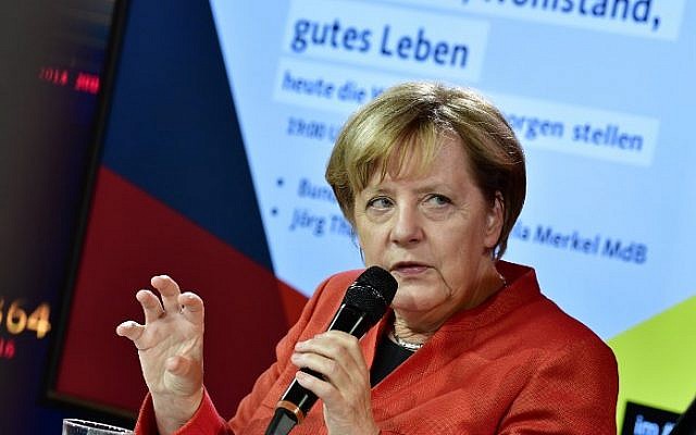 German Chancellor Angela Merkel attends an election campaign inside the walk-in campaign program in Berlin on September 9, 2017. 2017. (AFP PHOTO / TOBIAS SCHWARZ) German Chancellor Angela Merkel attends an election campaign inside the walk-in campaign program in Berlin on September 9, 2017. 2017. (AFP PHOTO / TOBIAS SCHWARZ)