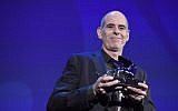 Director Samuel Maoz receives the Silver Lion - Grand Jury Prize for his movie "Foxtrot" during the award ceremony of the 74th Venice Film Festival on September 9, 2017 at Venice Lido.
 (AFP Photo/Tiziana Fabi)