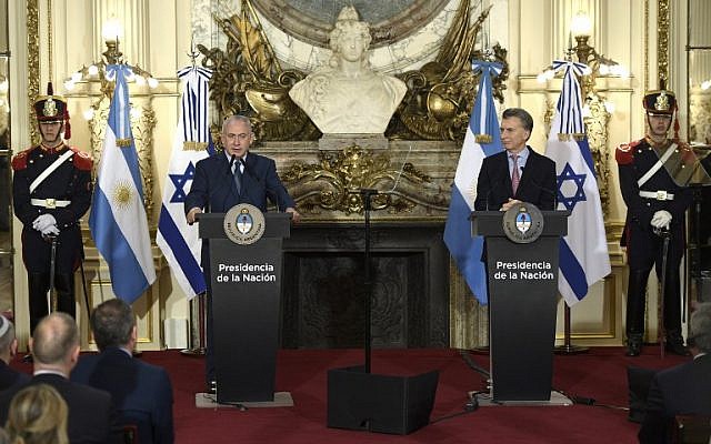 Prime Minister Benjamin Netanyahu, left, delivers a speech next to Argentina's President Mauricio Macri during a press conference at the Casa Rosada presidential house in Buenos Aires, September 12, 2017. (AFP/JUAN MABROMATA) Prime Minister Benjamin Netanyahu, left, delivers a speech next to Argentina's President Mauricio Macri during a press conference at the Casa Rosada presidential house in Buenos Aires, September 12, 2017. (AFP/JUAN MABROMATA)