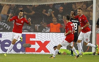 Illustrative: Hapoel Beersheba's Israeli midfielder Daniel Einbinder reacts after scoring during the UEFA Europa League football match between Hapoel Beer-Sheva FC and FC Lugano on September 14, 2017 at the Turner Stadium in Beersheba. (AFP PHOTO / JACK GUEZ)