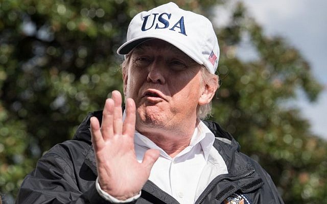 US President Donald Trump speaks to the press at the White House in Washington, DC, on September 14, 2017, upon return from Florida following Hurricane Irma. (AFP PHOTO / NICHOLAS KAMM)