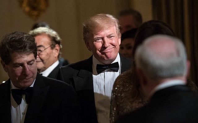 US President Donald Trump makes his way to his seat at the White House Historical Association dinner at the White House in Washington, DC, on September 14, 2017. (AFP PHOTO / NICHOLAS KAMM) US President Donald Trump makes his way to his seat at the White House Historical Association dinner at the White House in Washington, DC, on September 14, 2017. (AFP PHOTO / NICHOLAS KAMM)