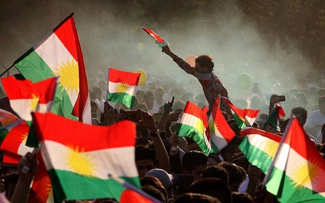 Iraqi Kurds fly Kurdish flags during an event to urge people to vote in the upcoming independence referendum in Arbil, the capital of the autonomous Kurdish region of northern Iraq, on September 15, 2017. (AFP/ SAFIN HAMED) Iraqi Kurds fly Kurdish flags during an event to urge people to vote in the upcoming independence referendum in Arbil, the capital of the autonomous Kurdish region of northern Iraq, on September 15, 2017. (AFP/ SAFIN HAMED)