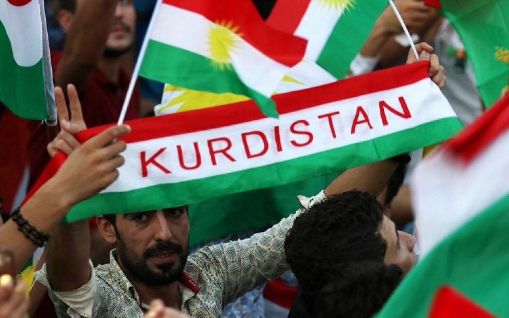 Iraqi Kurds fly Kurdish flags during an event to urge people to vote in the upcoming independence referendum in Irbil, the capital of the autonomous Kurdish region of northern Iraq, on September 16, 2017. (AFP/Safin Hamed) Iraqi Kurds fly Kurdish flags during an event to urge people to vote in the upcoming independence referendum in Irbil, the capital of the autonomous Kurdish region of northern Iraq, on September 16, 2017. (AFP/Safin Hamed)