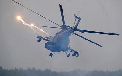 Illustrative: A Belarus' military helicopter flies during the Zapad military exercises, near the town of Ruzhany, some 235 km (147 miles) south-west of Minsk, on September 17, 2017. (AFP/Pool/Sergei Grits)
