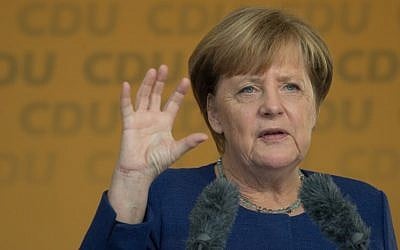 German Chancellor Angela Merkel addresses an election campaign rally of her Christian Democratic Union party in Fritzlar, Germany, on September 21, 2017. (AFP/dpa/Swen Pförtner)