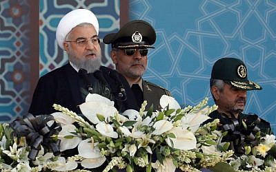 Iranian President Hassan Rouhani delivers a speech during the annual military parade marking the anniversary of the outbreak of its 1980-1988 war with Saddam Hussein's Iraq, on September 22, 2017, in Tehran. (AFP/stringer)