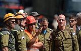 Illustrative: Israeli rescuers inspect damaged buildings in Alvaro Obregon, an area of Mexico City strongly affected by the September 19 earthquake, on September 22, 2017. (AFP Photo/Luis Manuel Perez)