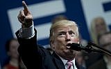 US President Donald Trump speaks during a rally for Alabama Republican Senator Luther Strange in Huntsville, Alabama, on September 22, 2017. (AFP Photo/Brendan Smialowski)
